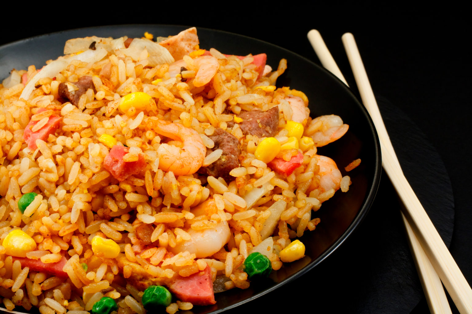 A plate of oriental food Special fried rice